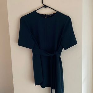 Asymmetric blouse with tie detail